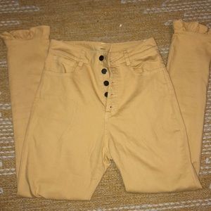 High waisted yellow jeans